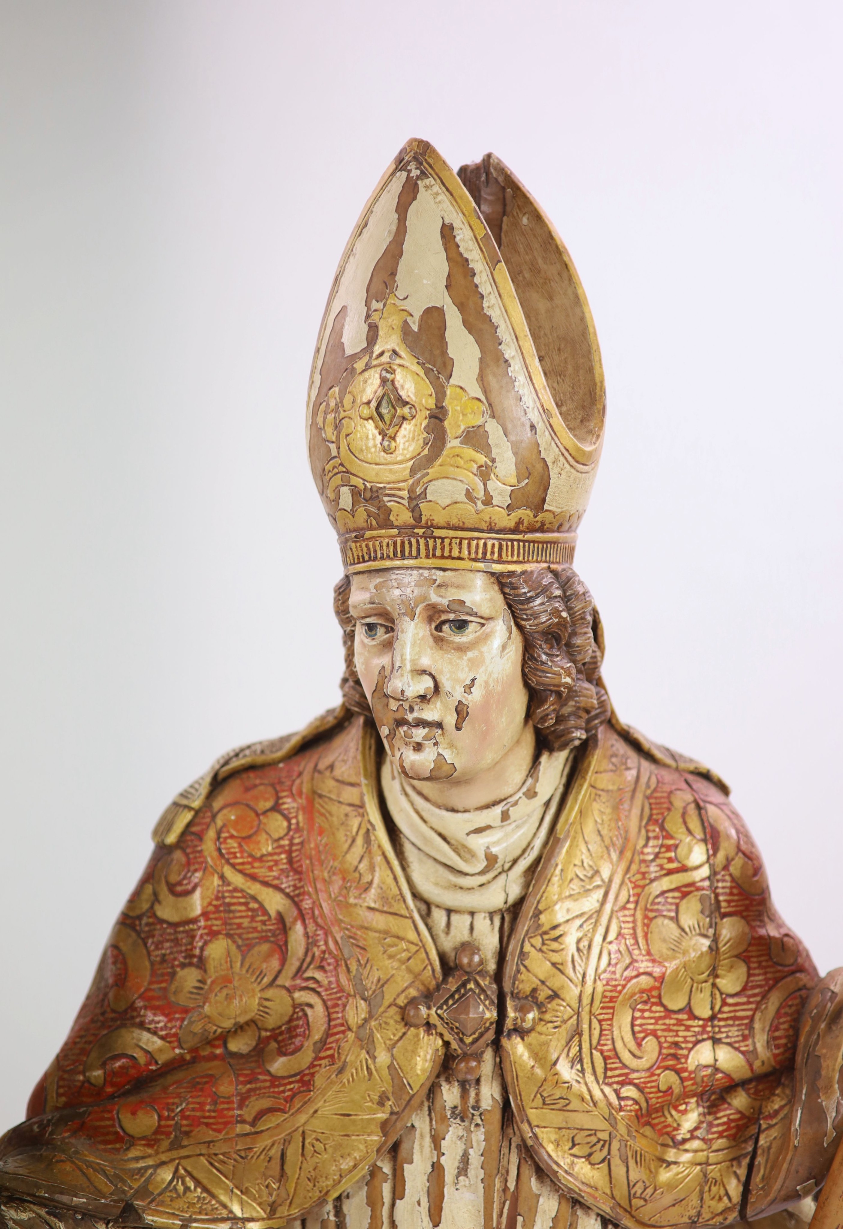 A 19th century German painted carved wood figure of St Ludgerus (b.742)standing holding a - Image 3 of 6