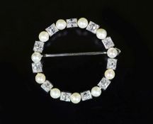 A mid 20th century French Cartier 18ct gold, pearl and diamond set open work circular brooch,