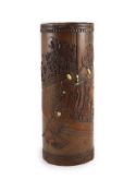 A tall Japanese bamboo and ivory inlaid brushpot, Meiji period,carved in relief with a warrior