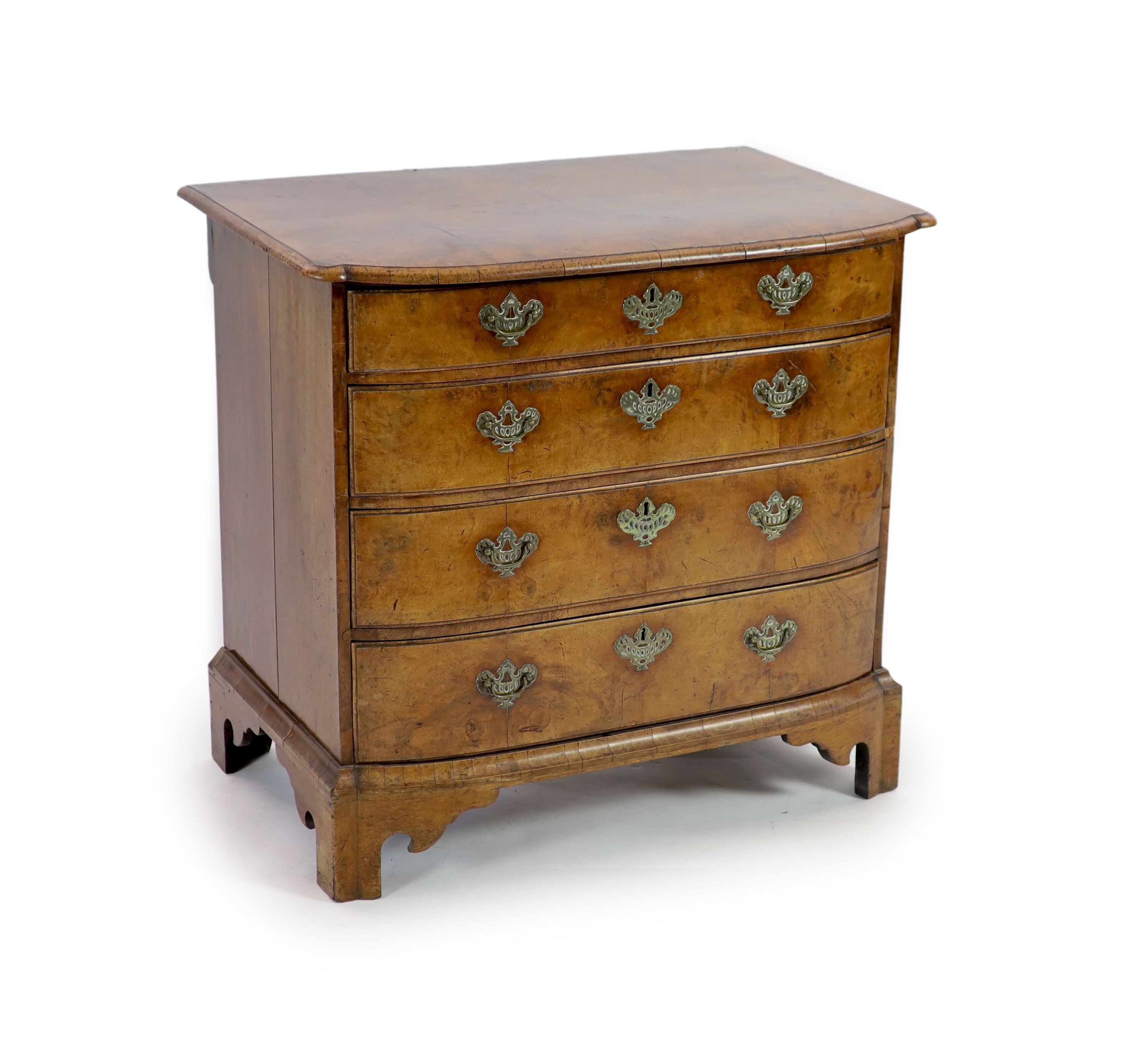 An 18th century Dutch walnut bowfront chestwith moulded top and four graduated long drawers, on