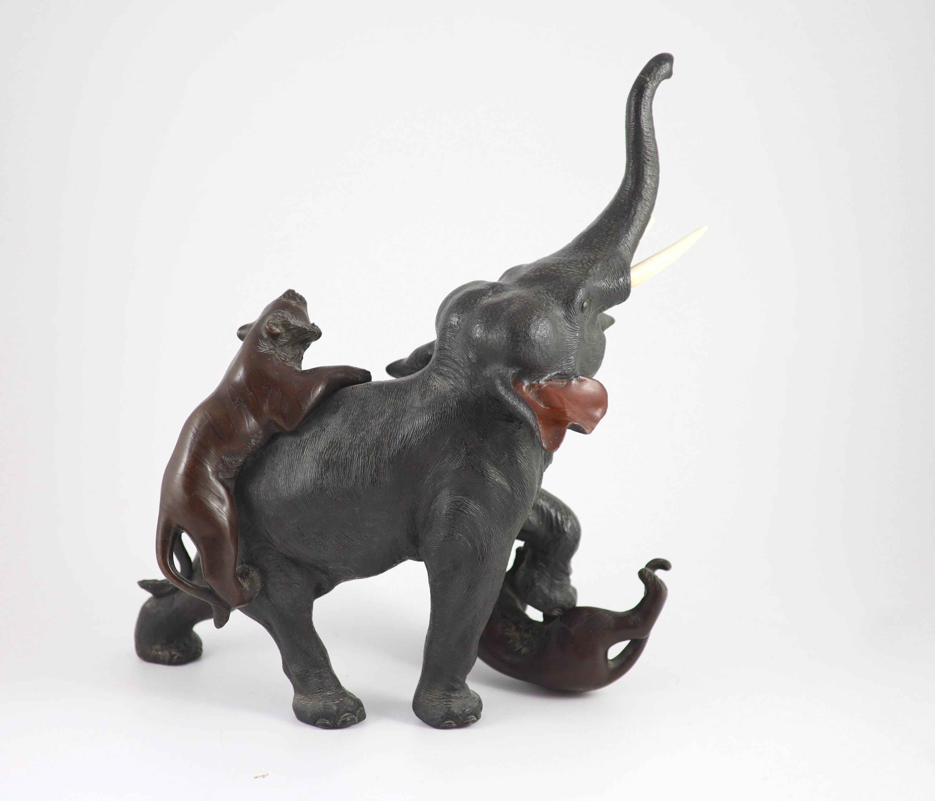 A good Japanese bronze elephant and tiger group, Meiji period signed Seiya saku,modelled as two - Image 5 of 7