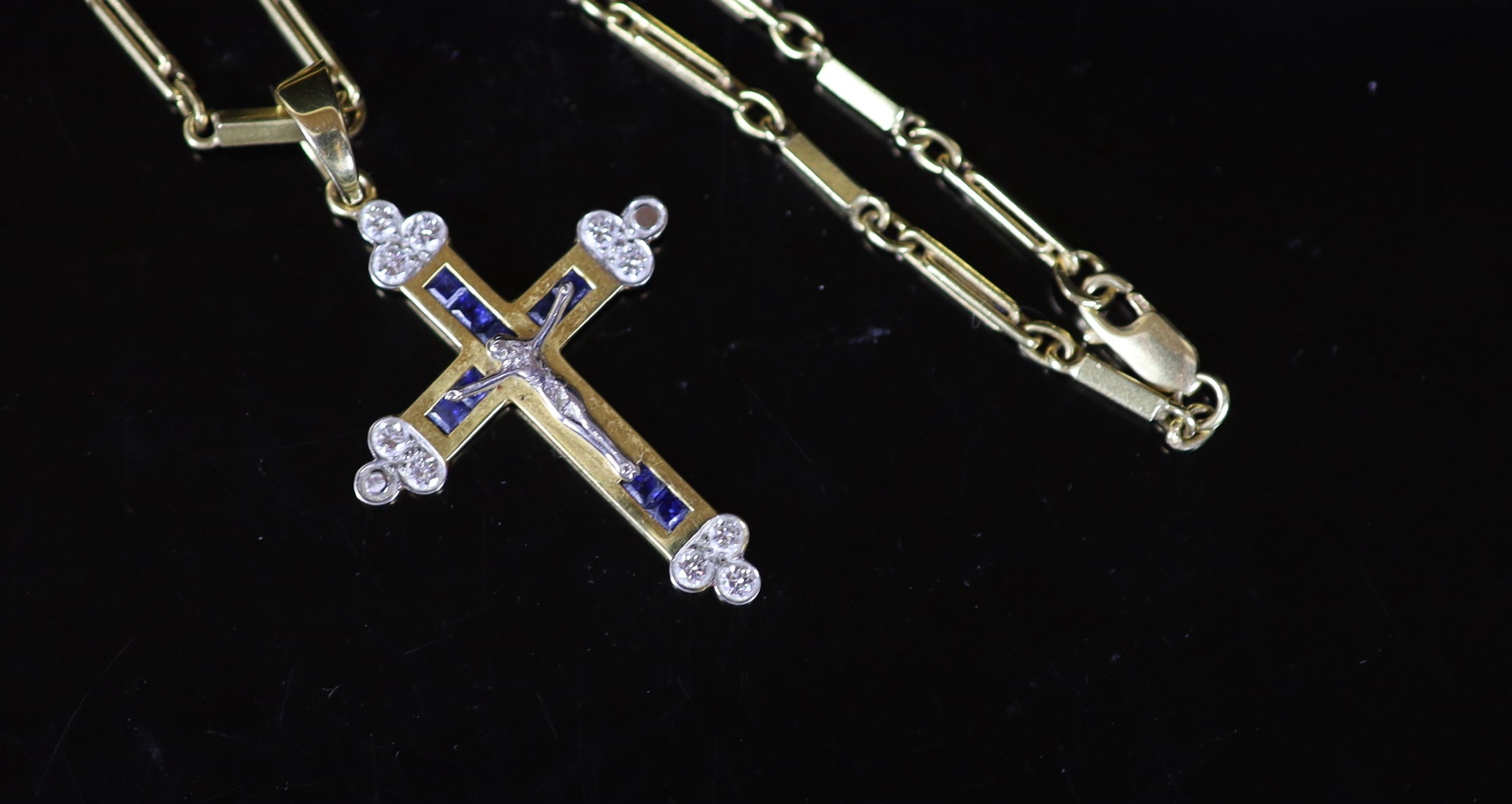 A modern 750 gold, sapphire and diamond set crucifix pendant, on a similar bar link chain,pendant - Image 2 of 3