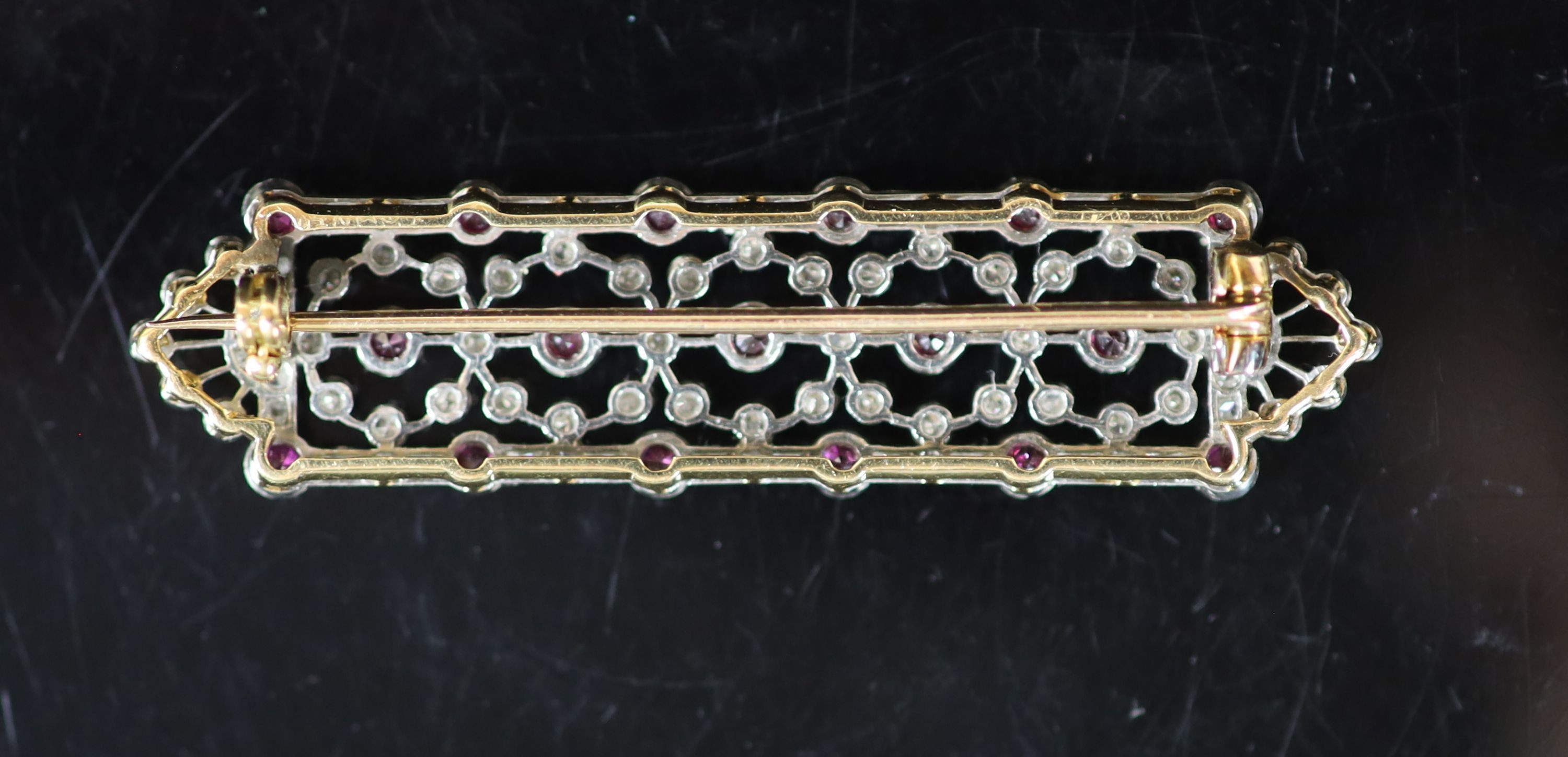 A 1920's/1930's style pierced gold and platinum, ruby and diamond chip millegrain set shaped - Image 2 of 2