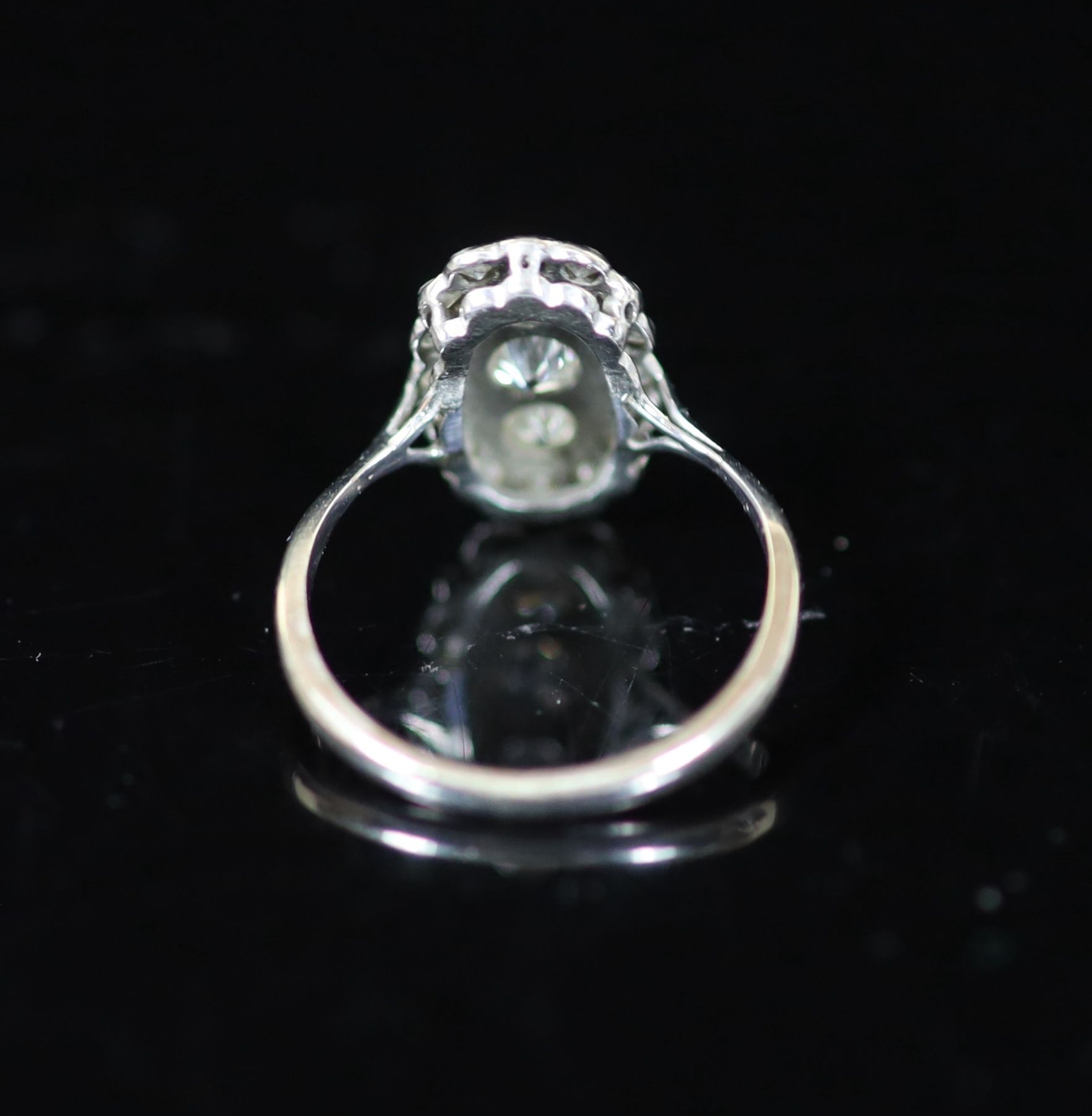 A 1940's 18ct white gold and diamond set oval cluster ring,size O/P, gross weight 3 grams. - Image 4 of 4