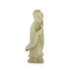 A Chinese pale celadon jade figure of a lady, 18th century,standing and holding a flower sprig,