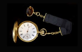 An 18ct gold full hunter keyless lever pocket watch, having white enamel Roman dial with