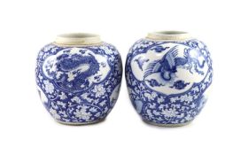 A good pair of Chinese blue and white ‘mythical beast’ jars, Kangxi period,each painted to shaped