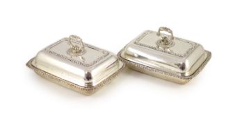 A pair of George III silver entrée dishes and covers, James Kirkby, Waterhouse & Co, Sheffield,