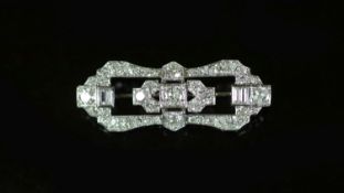 A 1940's/1950's platinum and diamond cluster set open work brooch,of waisted shaped oval form and