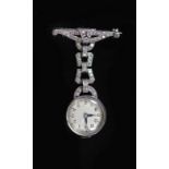 A lady's 1940's platinum and millegrain diamond set lapel watch,with Arabic dial, 45mm, gross weight