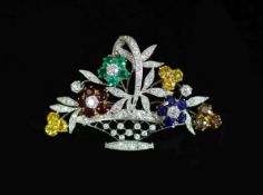 A mid 20th century platinum?, diamond and multi gem set giardinetto brooch,set with garnets,