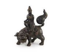 A large Chinese/Japanese bronze censer modelled as Wenshu riding a lion-dog, 17th/18th centurywith