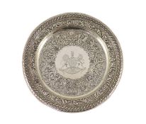 A George IV Irish embossed silver charger, by Stephen Bergin, engraved with the United Kingdom Royal