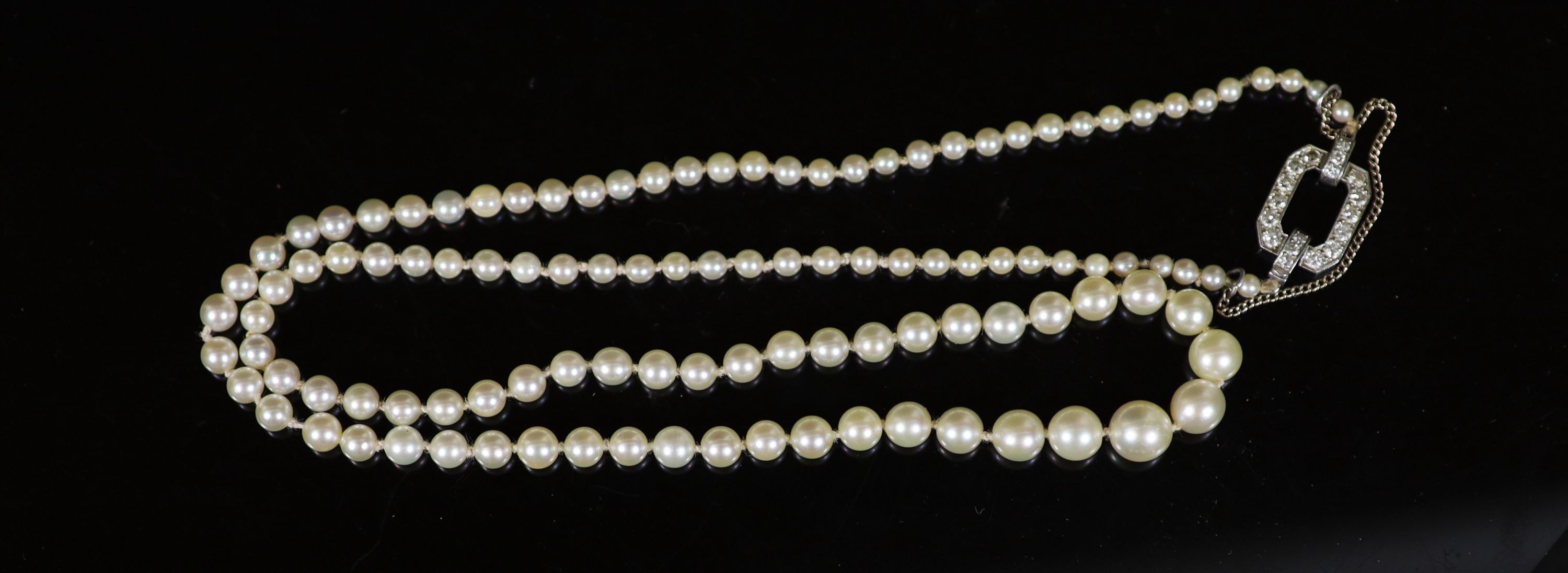 A mid 20th century single strand graduated pearl necklace, with platinum and diamond set open work - Image 3 of 3