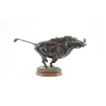 Tim Nicklin. A bronze model of a running warthogupon naturalistic base, signed and dated 1989, 2/10,