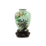 A Japanese plique-à-jour enamel vase, early 20th century,finely worked in silver wire and polychrome