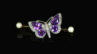 An early 20th century gold, shaped amethyst, rose cut diamond and two stone pearl set butterfly