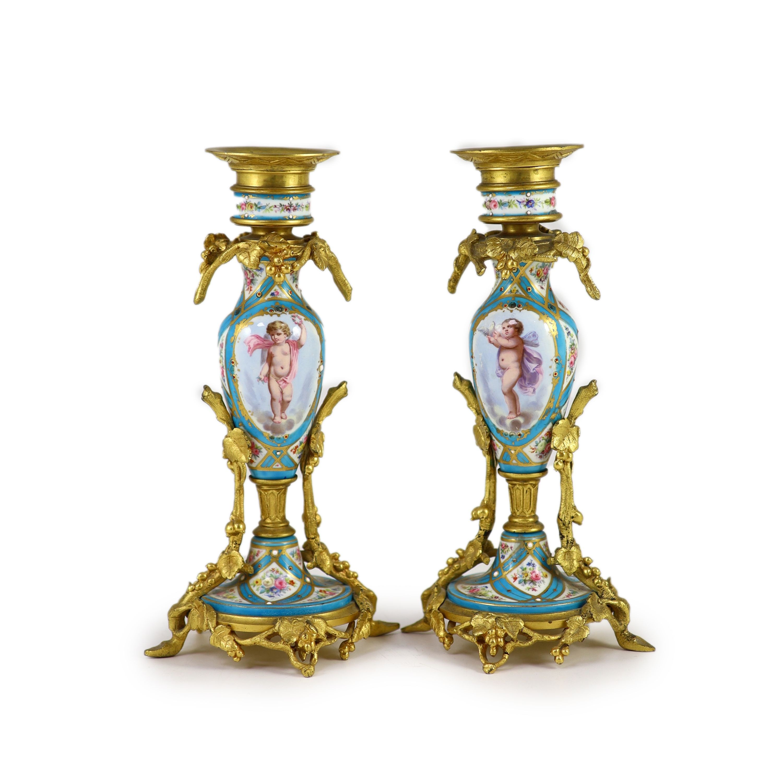 A pair of 19th century ormolu mounted Sevres style jewelled porcelain candlesticks,decorated with