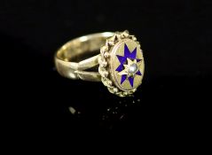 A Victorian 18ct gold, enamel and split pearl set oval ring (adapted),with central star motif,