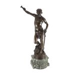 Antonin Mercié (1845-1916). A bronze figure of David standing holding a swordwith his foot resting