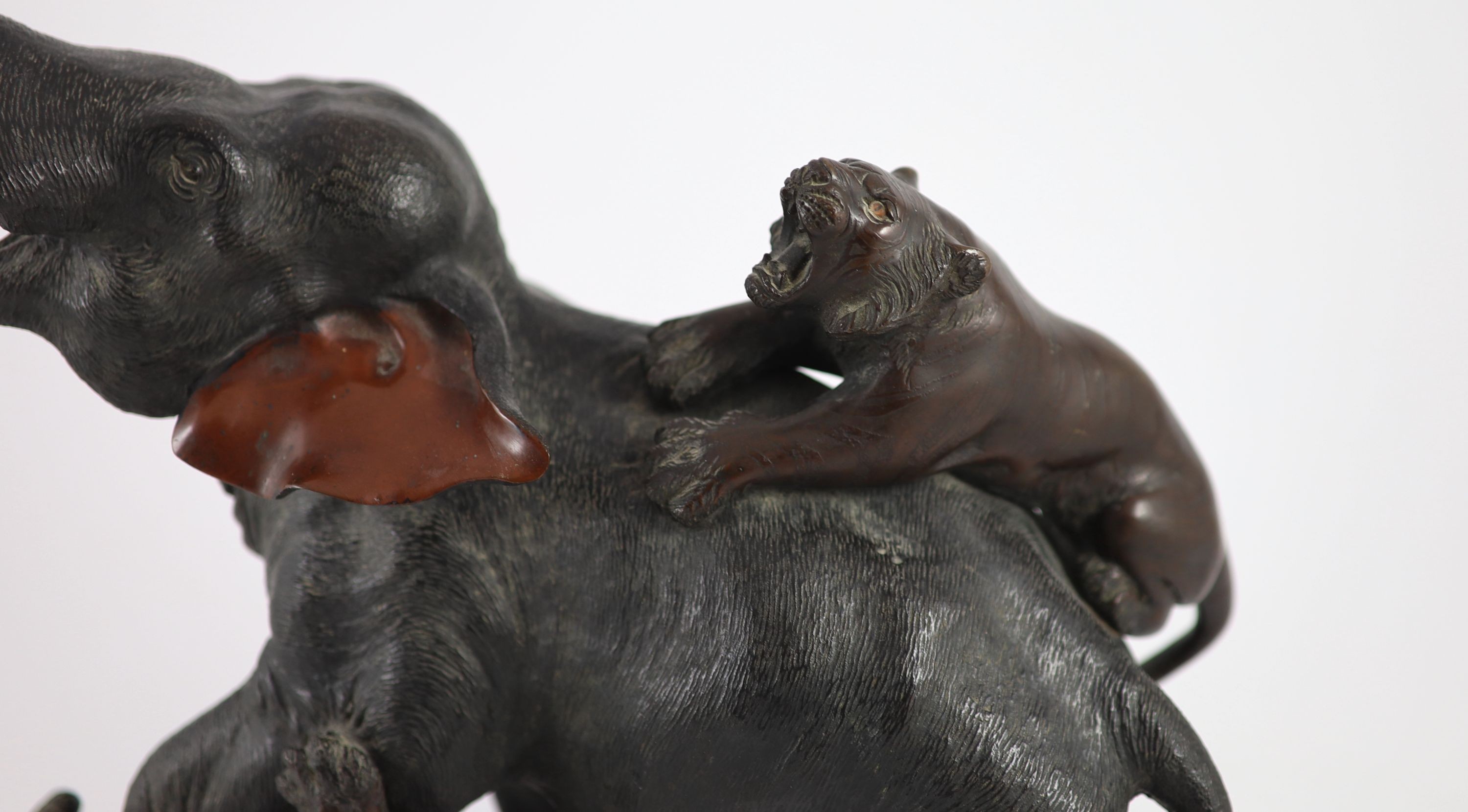 A good Japanese bronze elephant and tiger group, Meiji period signed Seiya saku,modelled as two - Image 4 of 7