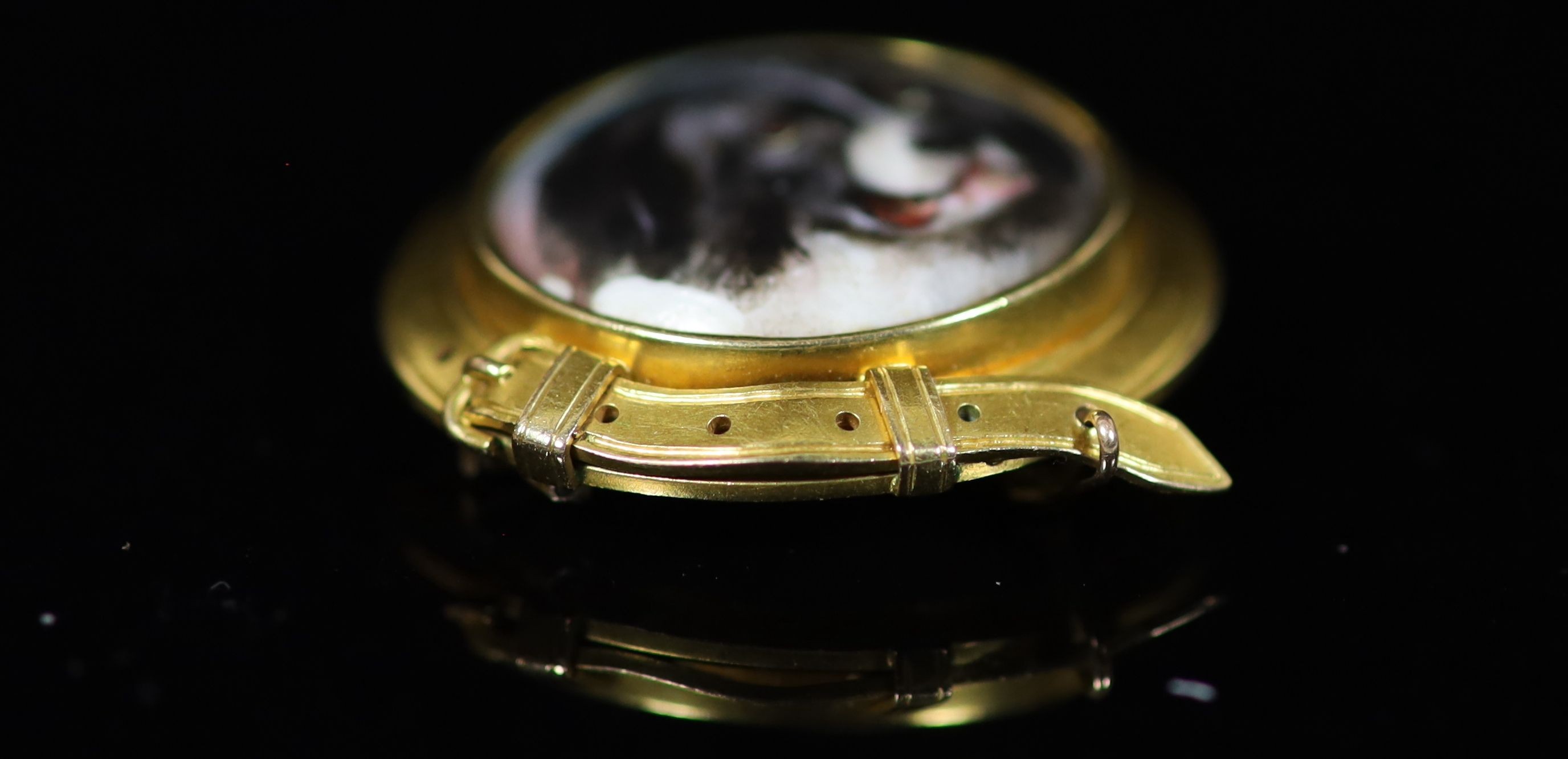 A Victorian gold and enamel circular brooch, decorated with the head of a dog, inscribed verso 'W. - Image 2 of 3