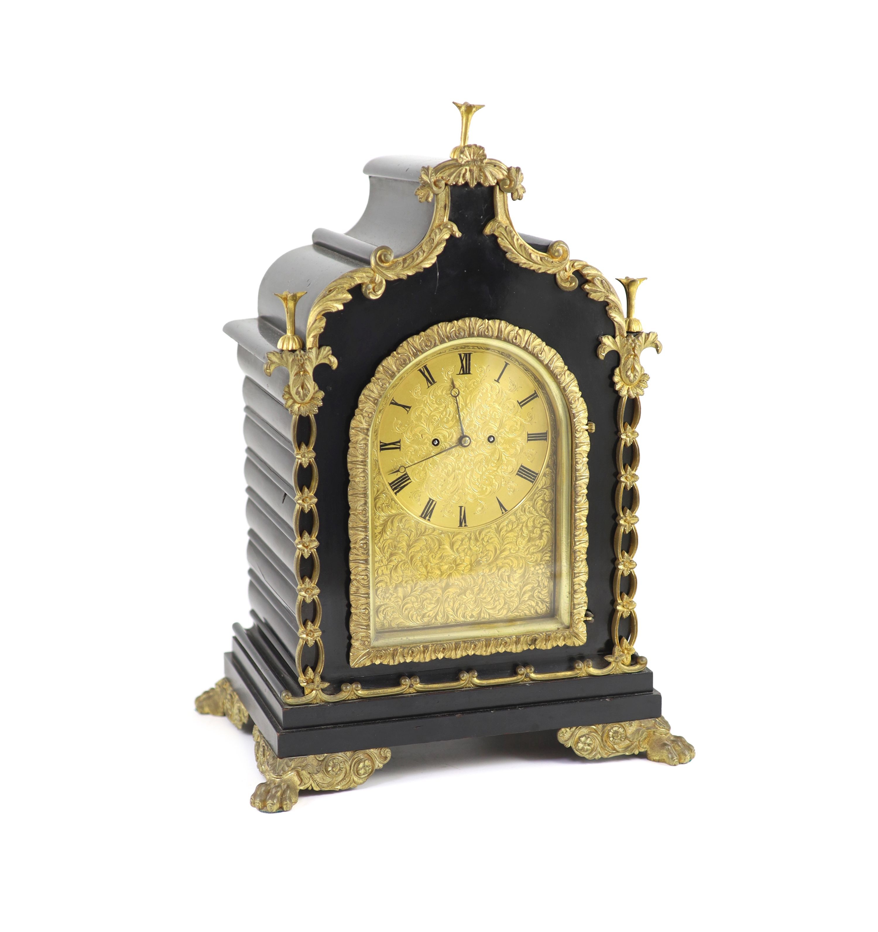 French, Royal Exchange, London. A Victorian ormolu mounted ebonised bracket clock,the shaped