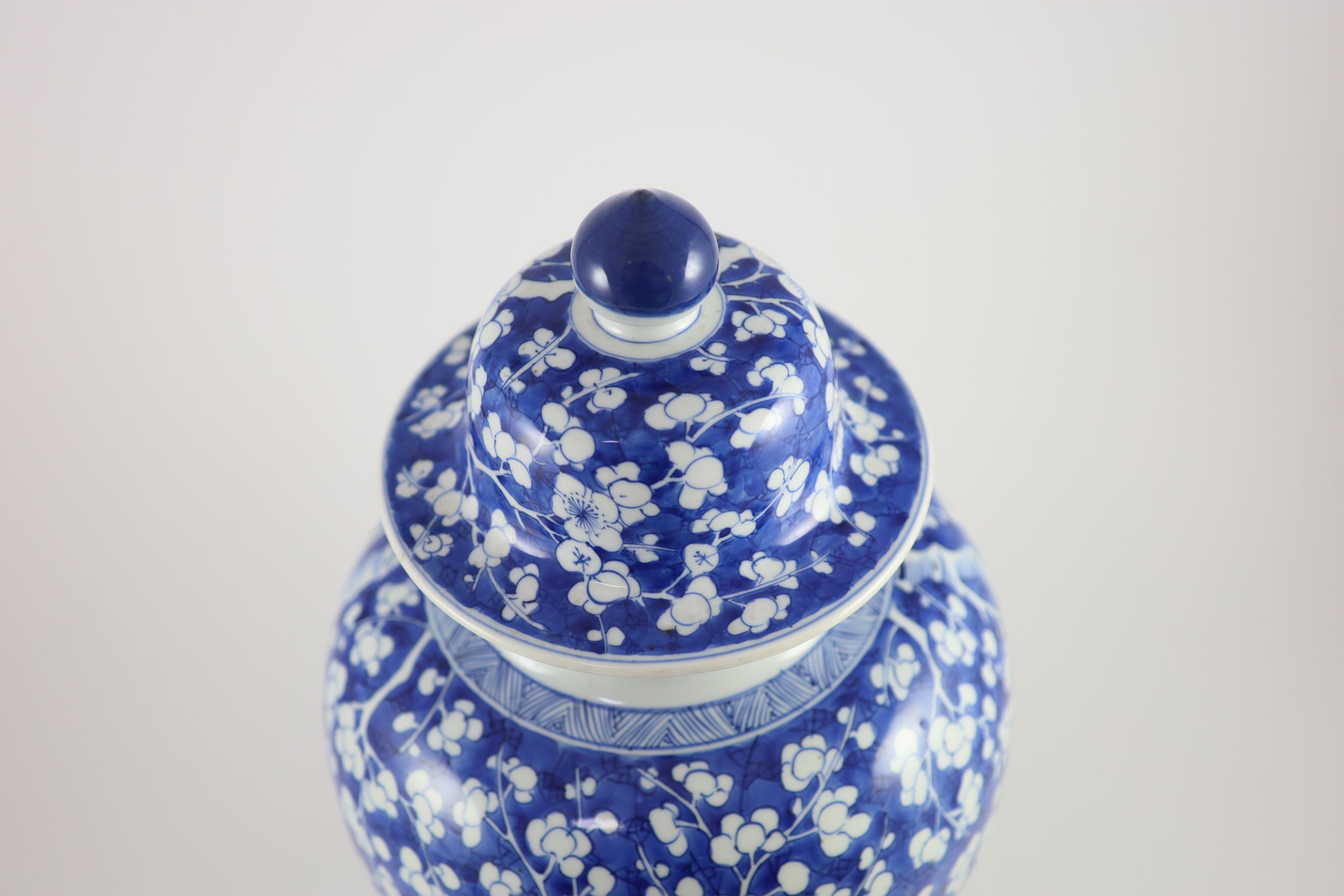 A good Chinese blue and white ‘prunus and cracked ice’ vase and cover, Kangxi period,with chevron - Image 3 of 5