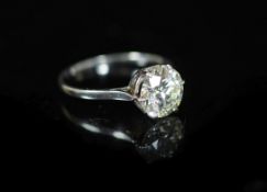 A platinum and solitaire diamond ring,the round brilliant cut stone weighing approximately 2.25ct,