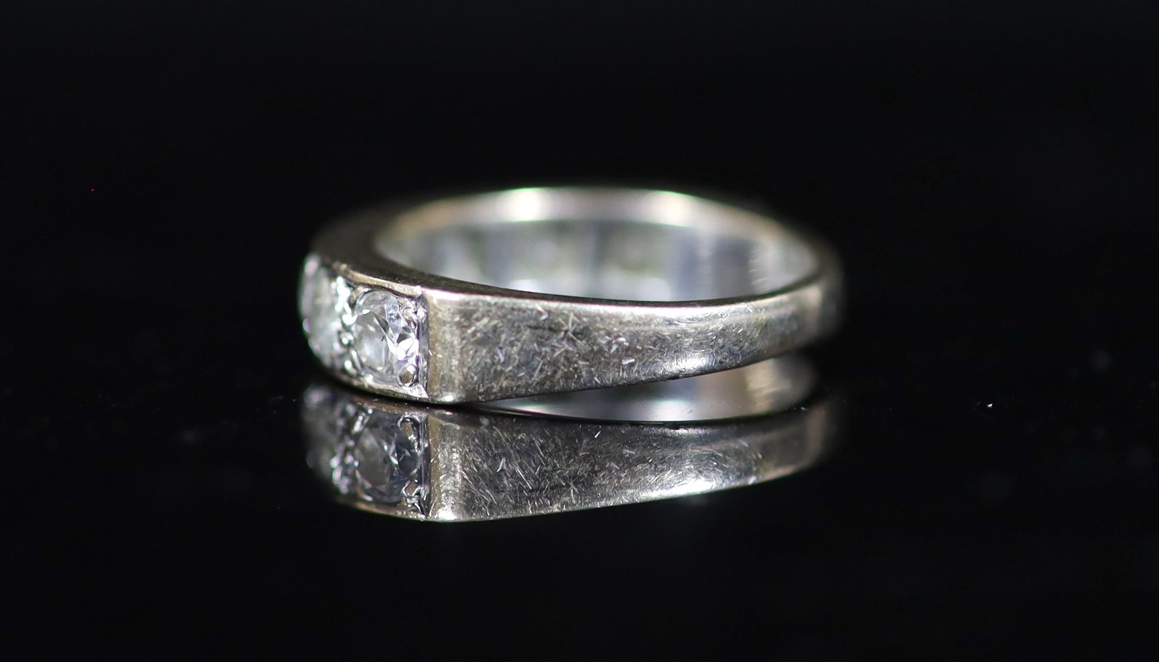 A modern white gold and channel set seven stone diamond half hoop ring,size P/Q, gross weight 6.4 - Image 3 of 4