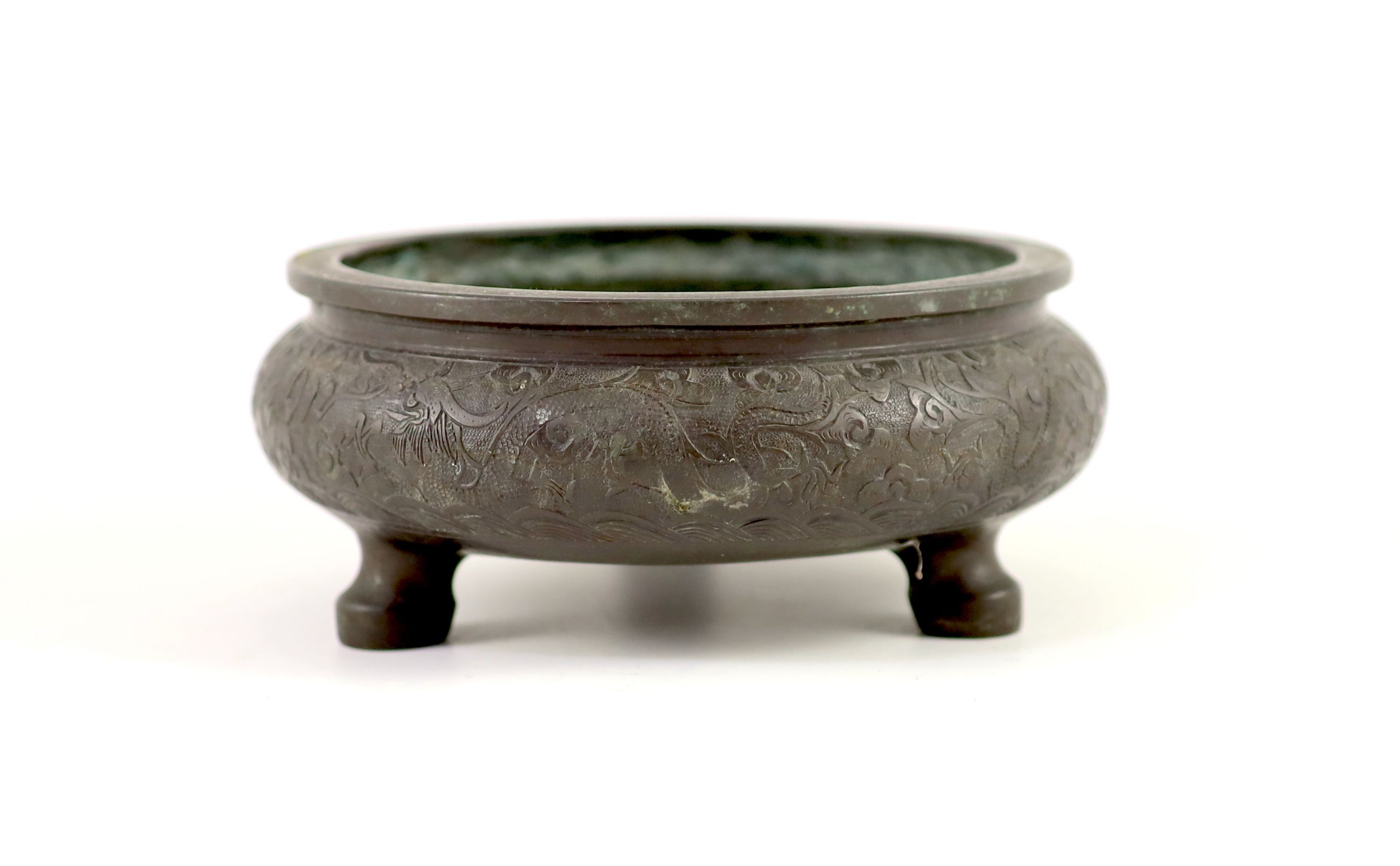 A Chinese bronze tripod censer, ding, 19th century,engraved and chased with dragons chasing a - Image 2 of 5