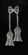 A good cased Belle Epoque white gold and millegrain set diamond encrusted graduated 'chandelier'