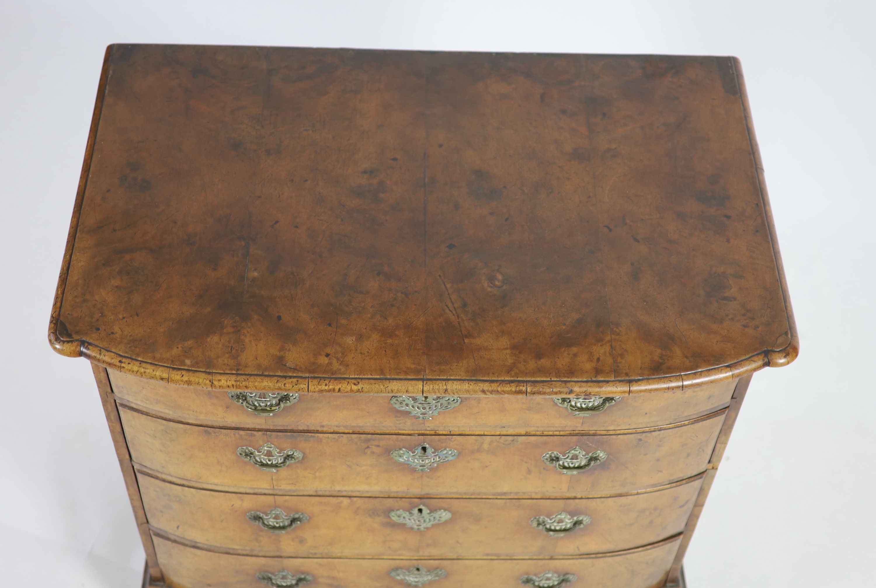 An 18th century Dutch walnut bowfront chestwith moulded top and four graduated long drawers, on - Image 3 of 4