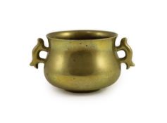 A Chinese bronze baluster shaped censer, gui, Xuande mark but 18th century,applied with a pair of