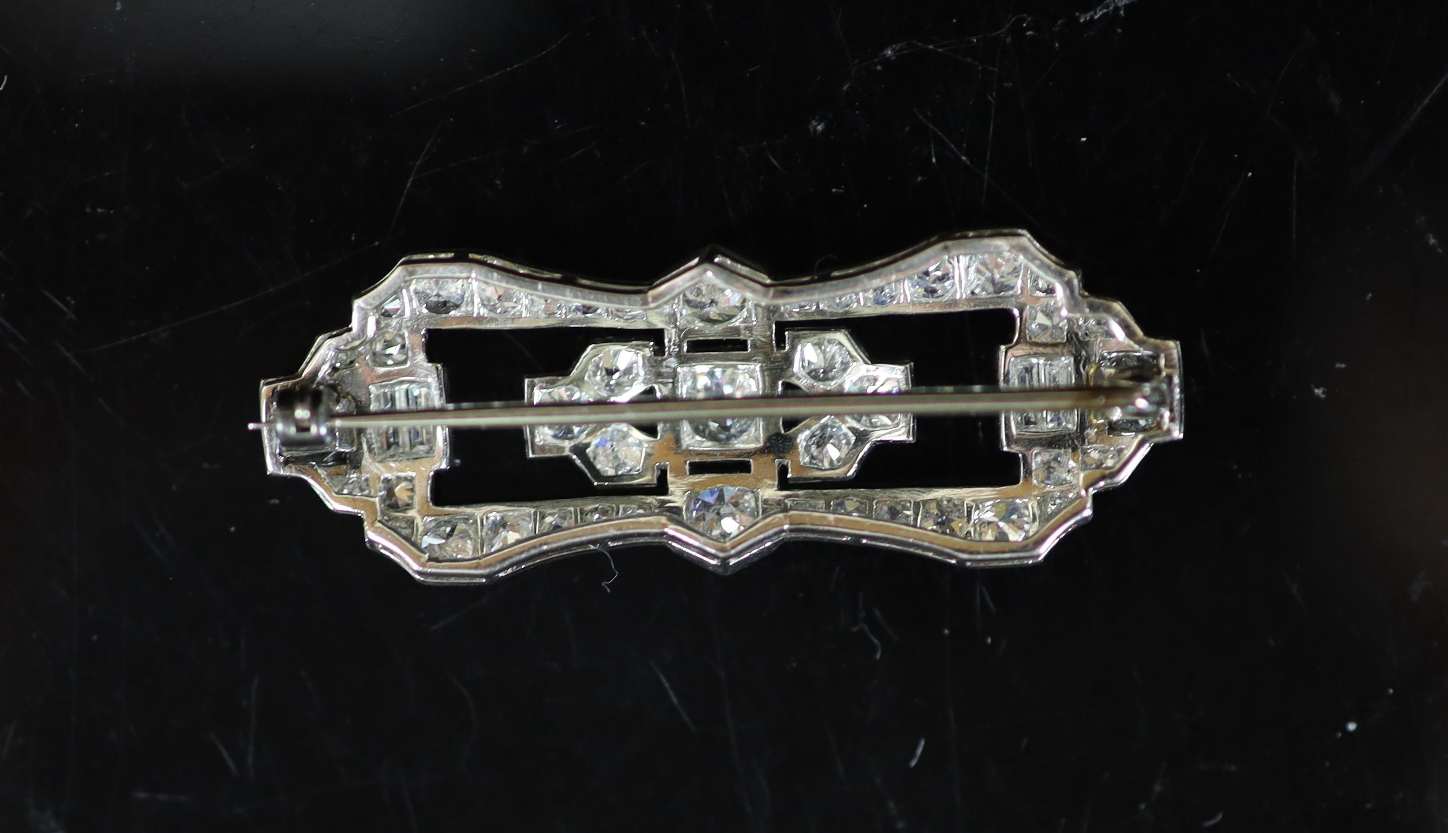A 1940's/1950's platinum and diamond cluster set open work brooch,of waisted shaped oval form and - Image 2 of 2
