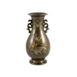 A Japanese bronze and mixed metal 'hare' vase, Meiji period,pear-shaped and applied with a pair of