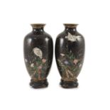 A pair of Japanese silver wire cloisonné enamel ‘egret’ vases, Meiji period,each decorated with