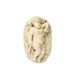 After Francois du Quesnoy (1594-1643). An oval ivory relief of sleeping Cupid, possibly
