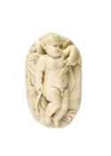 After Francois du Quesnoy (1594-1643). An oval ivory relief of sleeping Cupid, possibly