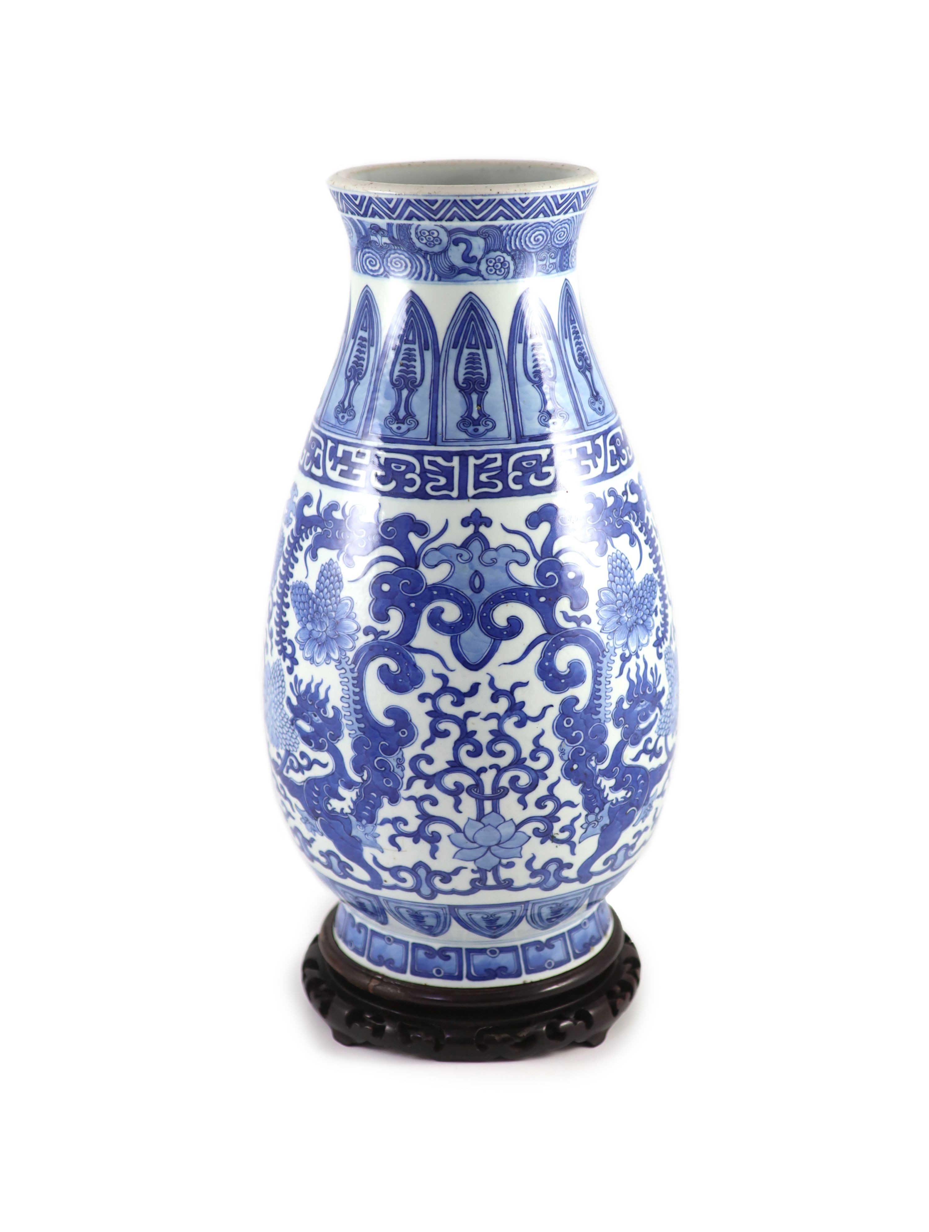 A Chinese archaistic blue and white pear-shaped vase, Qianlong mark but 19th century,finely