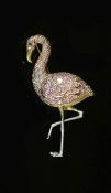 A modern two colour 18ct gold and diamond encrusted brooch, modelled as a flamingo,with cabochon