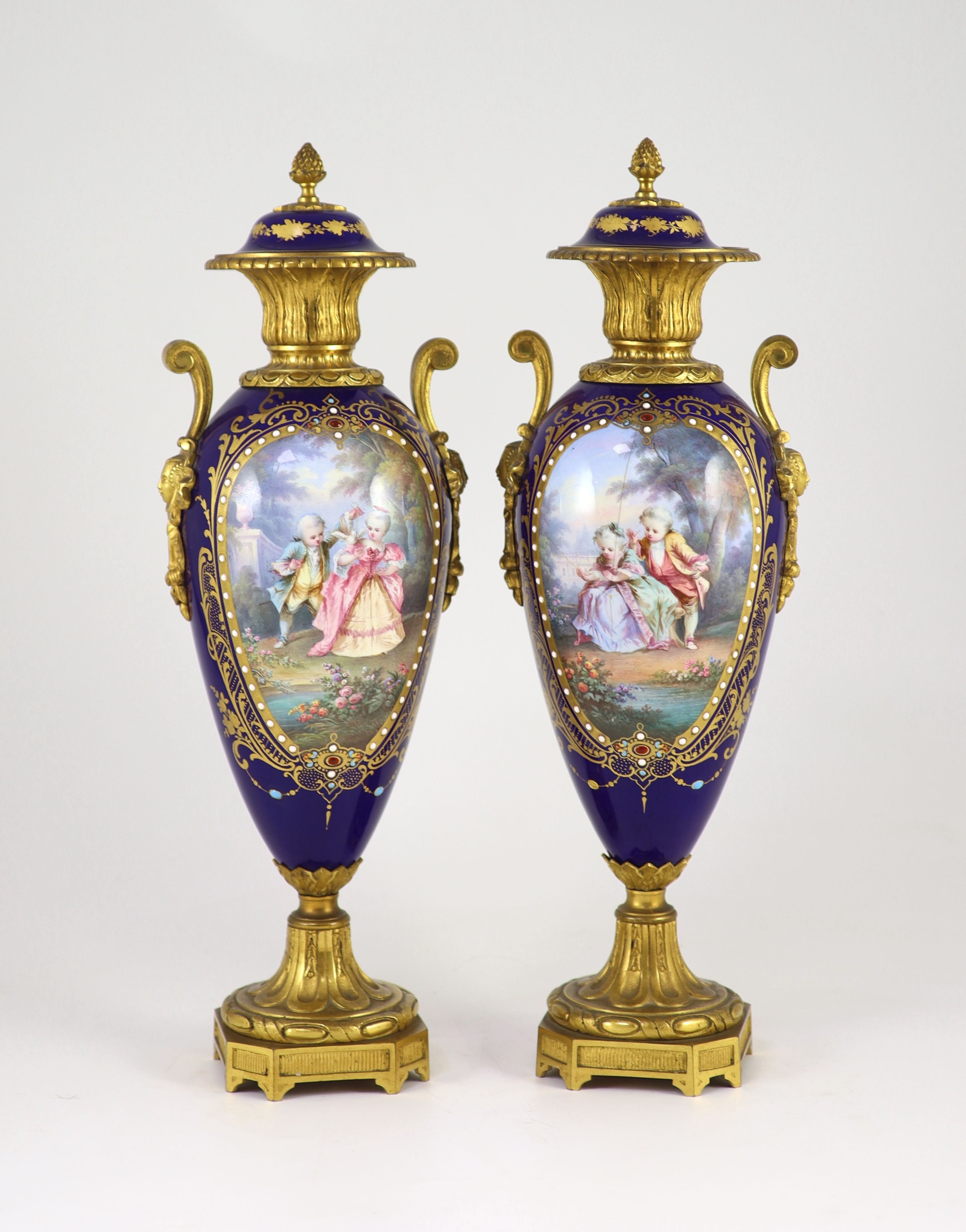 A pair of Sevres style ‘jewelled’ porcelain and ormolu mounted vases, c.1900,each of oviform, - Image 2 of 4