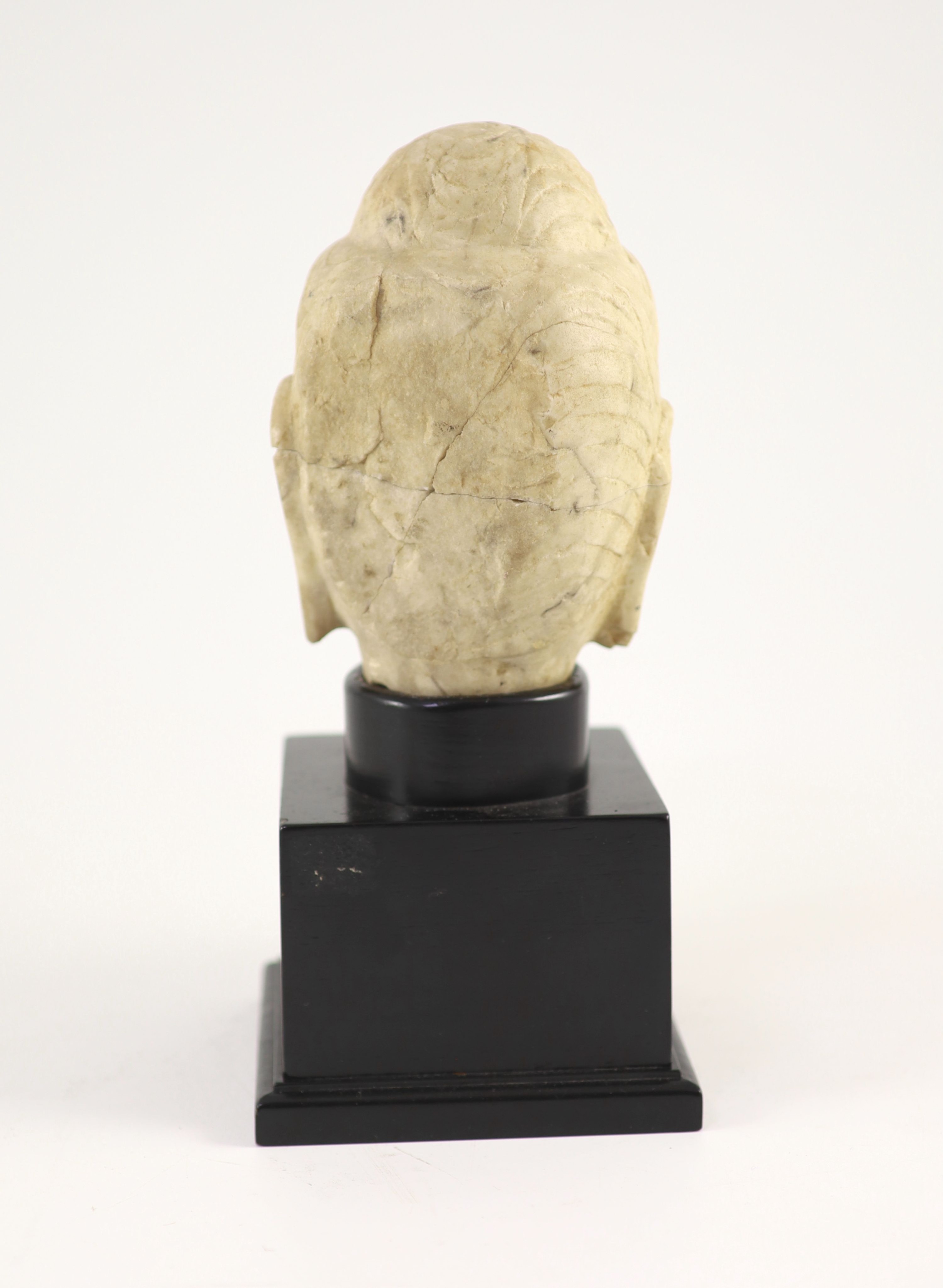 A Chinese carved white marble head of Buddha, Tang dynasty (618-907 AD),Provenance - purchased by - Image 3 of 3