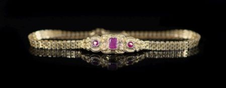 A 19th century French gold and three stone gem set bracelet,16cm, gross 6.8 grams.