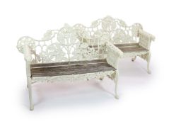 After Coalbrookdale, a pair of cast iron ‘Oak and ivy' bencheswith white paintwork and teak