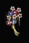 A 20th century French Van Cleef & Arpels 18ct gold, ruby, sapphire and diamond cluster set floral