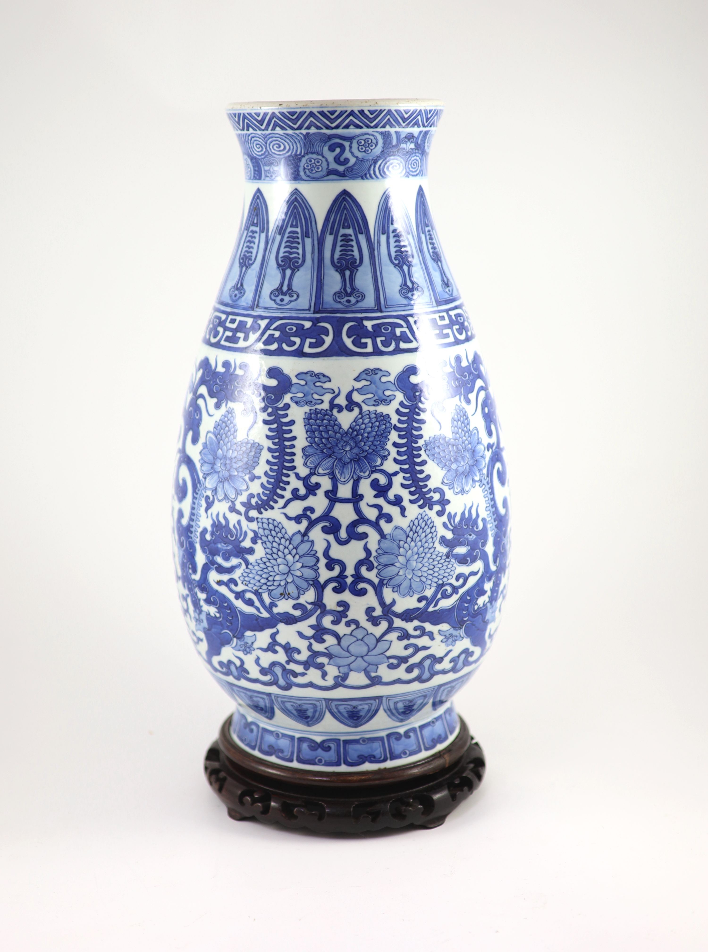 A Chinese archaistic blue and white pear-shaped vase, Qianlong mark but 19th century,finely - Image 2 of 4