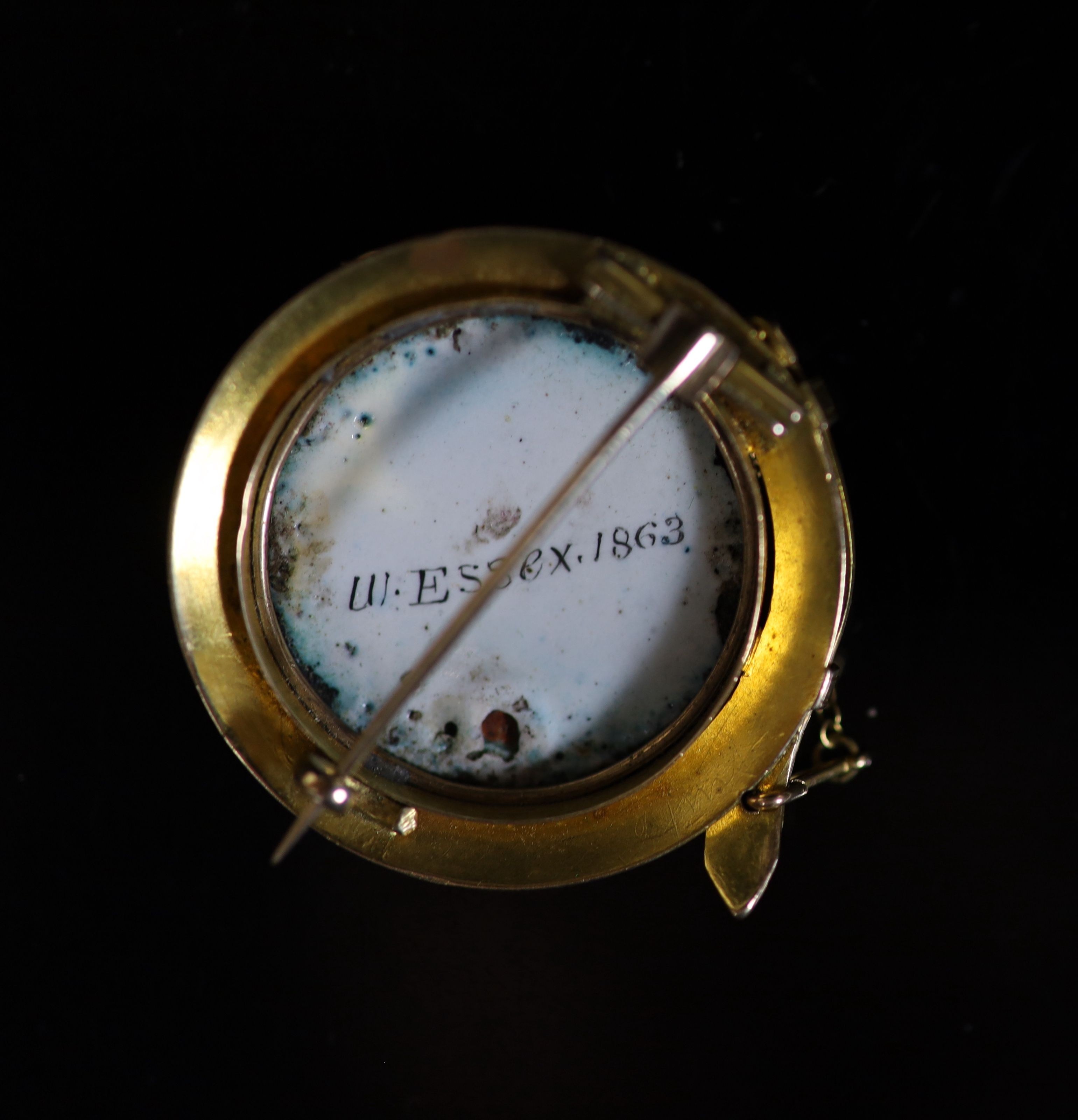 A Victorian gold and enamel circular brooch, decorated with the head of a dog, inscribed verso 'W. - Image 3 of 3