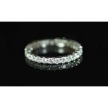 A Boucheron platinum and diamond full eternity ring,set with twenty seven modern round brilliant cut