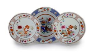 A pair of Chinese export famille rose dishes and a similar charger, early Qianlong period,The pair